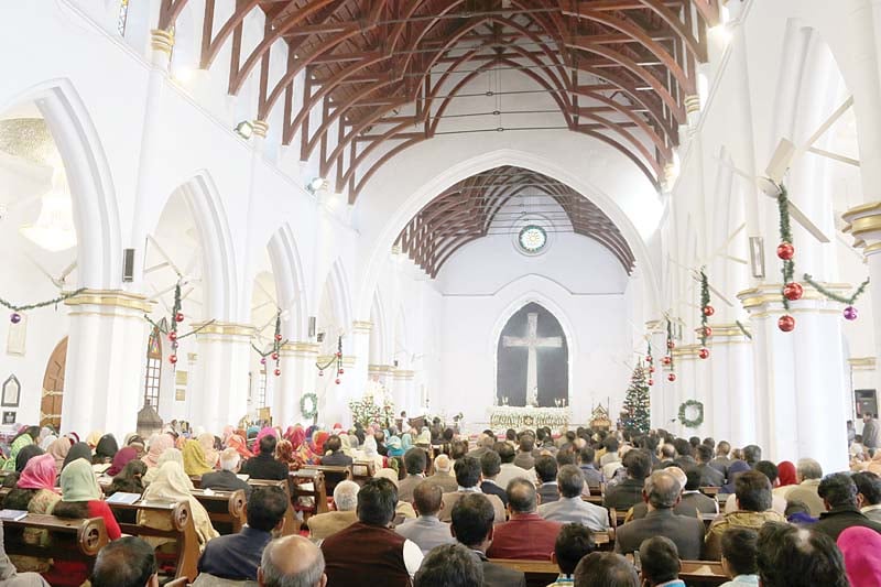 a christmas mass underway at saint john s cathedral in peshawar photo muhammad iqbal express