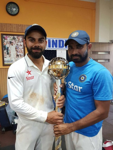 indian fast bowler mohammed shami r poses with batsman virat kohli l photo twitter com mdshami11 indian fast bowler mohammed shami r poses with batsman virat kohli l photo twitter com mdshami11