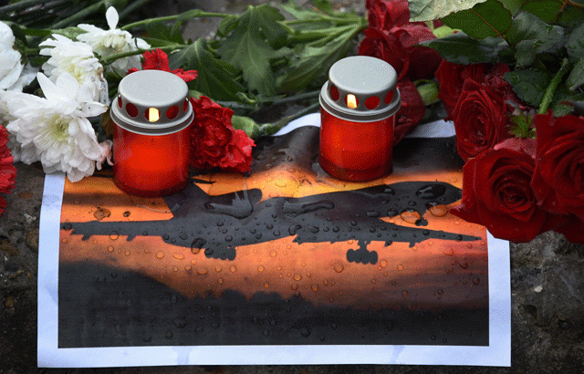 a picture shows candles and flowers layed next to a picture of an airplane at a memorial on a pier outside sochi on december 26 2016 as russia observes a national day of mourning a day after a military plane carrying 92 people including dozens of members of the red army choir crashed in the black sea photo afp a picture shows candles and flowers layed next to a picture of an airplane at a memorial on a pier outside sochi on december 26 2016 as russia observes a national day of mourning a day after a military plane carrying 92 people including dozens of members of the red army choir crashed in the black sea photo afp