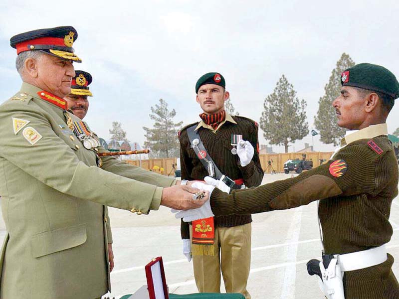 army chief gen qamar awards a cane to a cadet at the passing out parade in quetta photo app