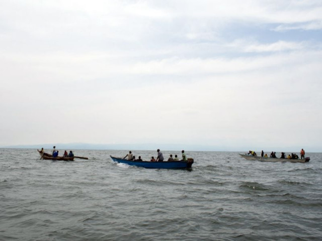 rescuers rush to save people on the sinking boat photo afp rescuers rush to save people on the sinking boat photo afp