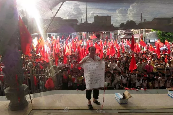 villager wei yonghan makes a speech before assembled wukan villagers who are demanding justice for a series of land grabs and for the release of their elected village chief lin zuluan who was arrested by authorities in the southern province of guangdong china photo reuters villager wei yonghan makes a speech before assembled wukan villagers who are demanding justice for a series of land grabs and for the release of their elected village chief lin zuluan who was arrested by authorities in the southern province of guangdong china photo reuters