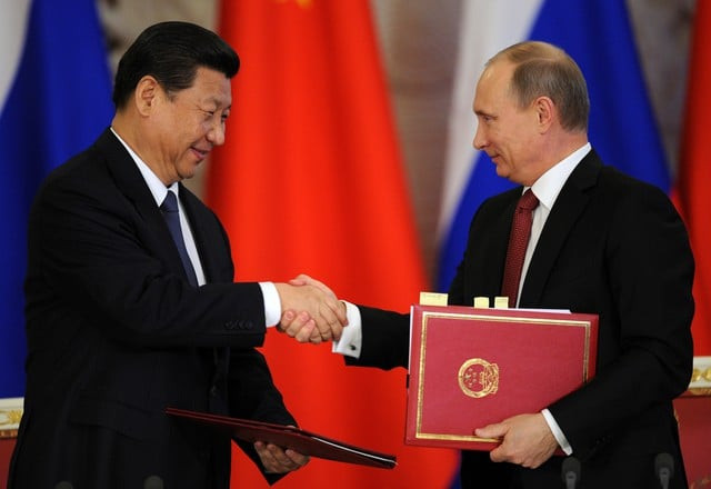 chinese president xi jinping meets russian prime minister vladimir putin photo reuters chinese president xi jinping meets russian prime minister vladimir putin photo reuters