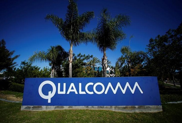 a qualcomm sign is pictured in front of one of its many buildings in san diego california november 5 2014 photo reuters