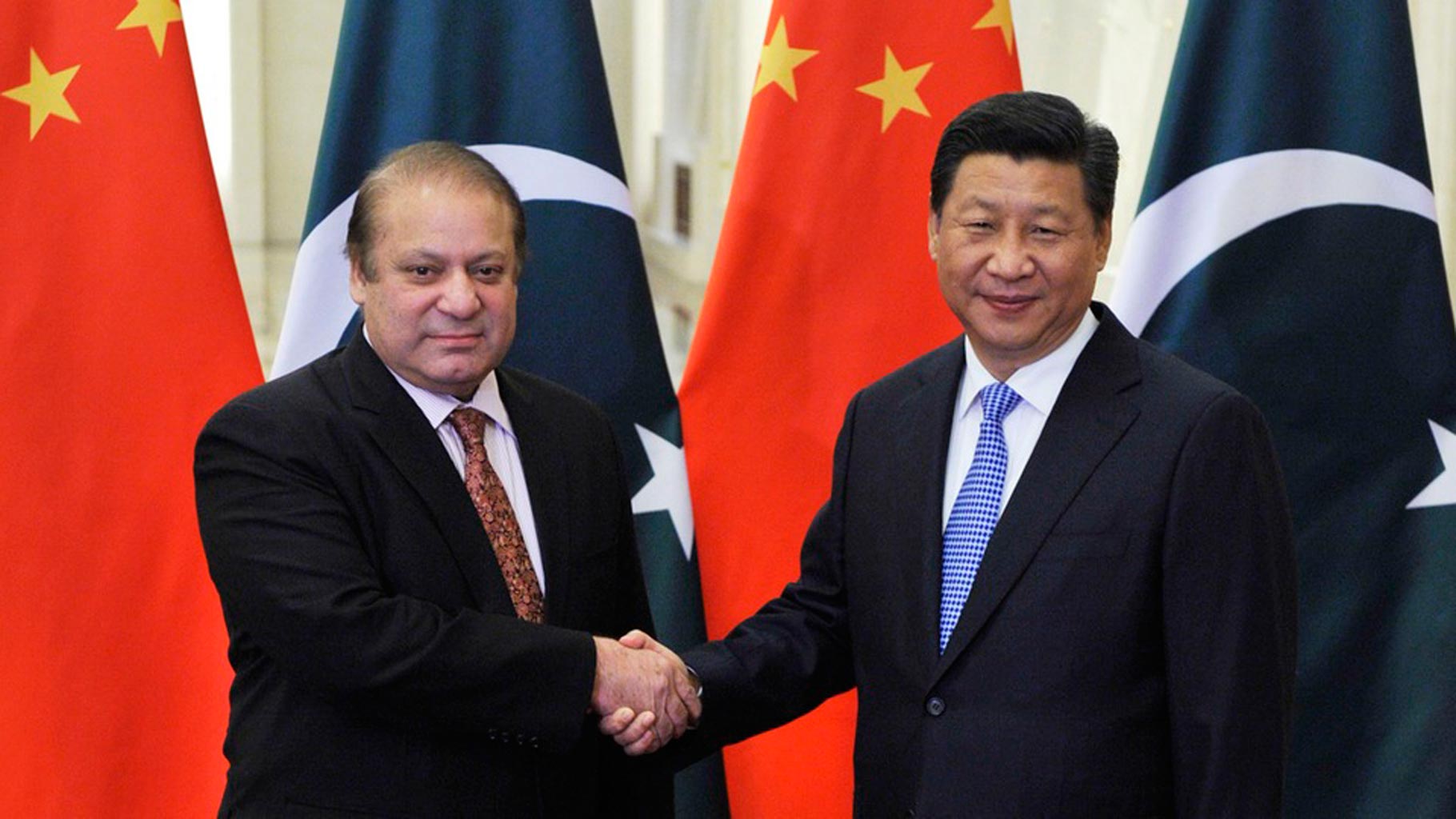 pakistan s prime minister nawaz sharif l greets china s president xi jinping photo reuters