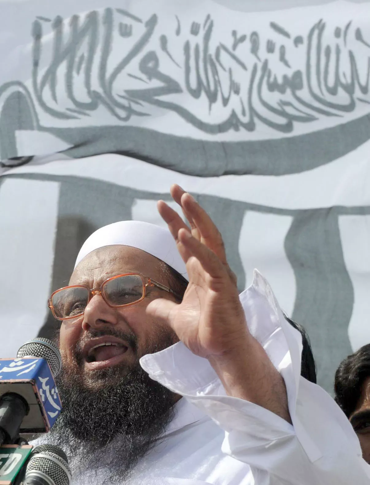 founder of lashkar e taiba let hafiz saeed addresses a rally during a protest in lahore on may 25 2012 against the pakistani governments plan to reopen nato supplies route to afghanistan photo afp founder of lashkar e taiba let hafiz saeed addresses a rally during a protest in lahore on may 25 2012 against the pakistani governments plan to reopen nato supplies route to afghanistan photo afp