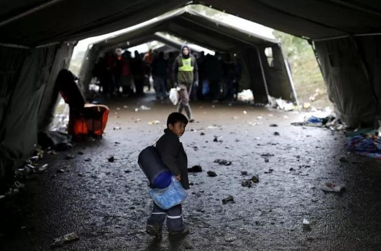 a migrant child walks towards the border crossing with croatia near the village of berkasovo serbia photo reuters a migrant child walks towards the border crossing with croatia near the village of berkasovo serbia photo reuters