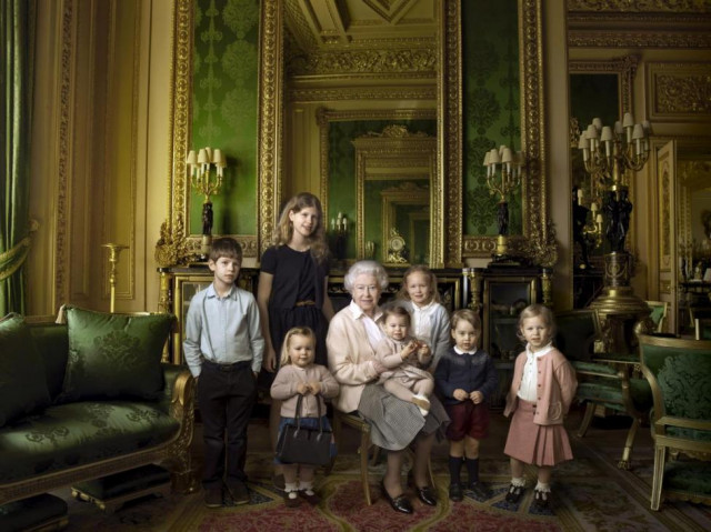 queen elizabeth ii poses with her five great grandchildren and her two youngest grandchildren in the green drawing room part of windsor castle 039 s semi state apartments the children are james viscount severn left 8 and lady louise second left 12 the children of the earl and countess of wessex mia tindall holding the queen 039 s handbag the two year old daughter of zara and mike tindall savannah third right 5 and isla phillips right 3 daughters of the queen 039 s eldest grandson peter phillips and his wife autumn prince george second right 2 and in the queen 039 s arms and in the tradition of royal portraiture the youngest great grandchild princess charlotte 11 months children of the duke and duchess of cambridge in this official photograph released by buckingham palace to mark her 90th birthday photo reuters queen elizabeth ii poses with her five great grandchildren and her two youngest grandchildren in the green drawing room part of windsor castle 039 s semi state apartments the children are james viscount severn left 8 and lady louise second left 12 the children of the earl and countess of wessex mia tindall holding the queen 039 s handbag the two year old daughter of zara and mike tindall savannah third right 5 and isla phillips right 3 daughters of the queen 039 s eldest grandson peter phillips and his wife autumn prince george second right 2 and in the queen 039 s arms and in the tradition of royal portraiture the youngest great grandchild princess charlotte 11 months children of the duke and duchess of cambridge in this official photograph released by buckingham palace to mark her 90th birthday photo reuters