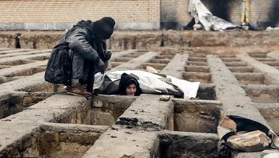 one of the many homeless dwellers in a cemetery in the town of shahriar near iran s capital tehran photo twitter