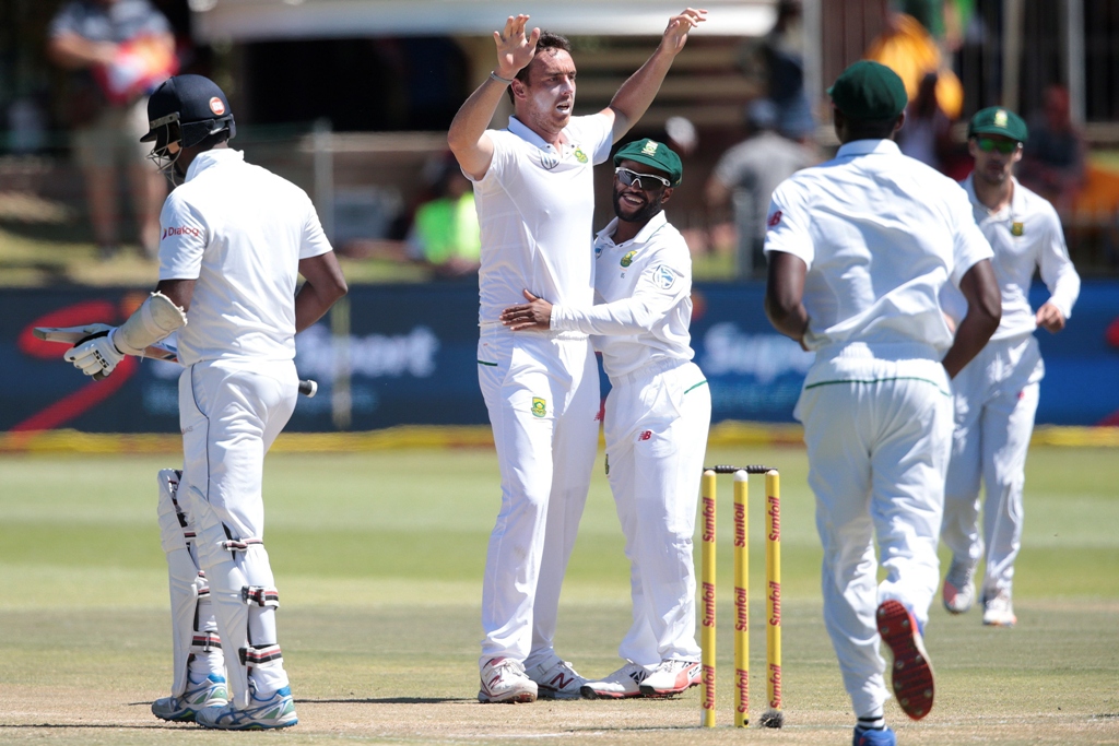 simple as you like south african bowler kyle abbott celebrates the dismissal of sri lanka batsman and captain angelo mathews l during the fifth day of the first test the hosts took just 13 3 overs to run through sri lanka s remaining five wickets photo afp