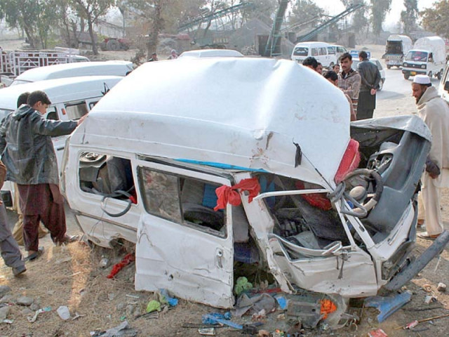people look at the wreckage of the van involved in the deadly accident photo app people look at the wreckage of the van involved in the deadly accident photo app
