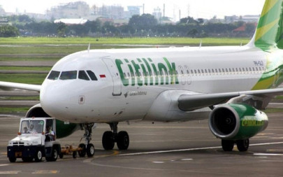 indonesian pilot fired after slurred cockpit announcement indonesian pilot fired after slurred cockpit announcement