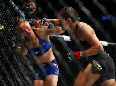nunes stuns challenger rousey with first round title win nunes stuns challenger rousey with first round title win