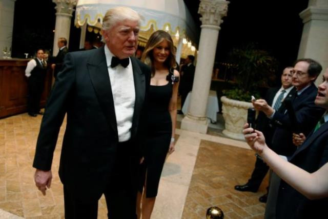 u s president elect donald trump talks to reporters as he and his wife melania trump arrive for a new year 039 s eve celebration with members and guests at the mar a lago club in palm beach florida us december 31 2016 photo reuters u s president elect donald trump talks to reporters as he and his wife melania trump arrive for a new year 039 s eve celebration with members and guests at the mar a lago club in palm beach florida us december 31 2016 photo reuters