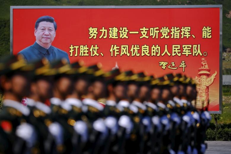 a picture of chinese president xi jinping is seen on a billboard photo reuters