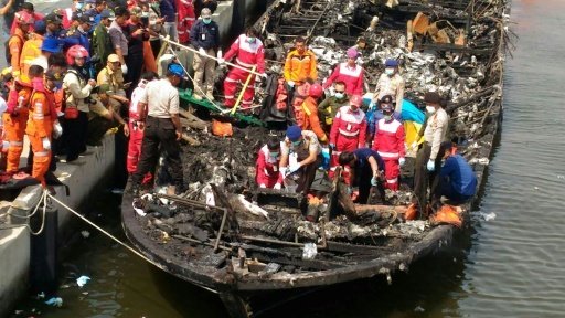 23 dead as indonesia passenger boat catches fire photo afp