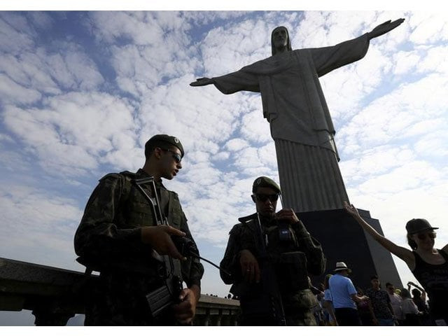 brazilian security forces stand guard under the christ the redeemer statue in rio de janeiro brazil august 6 2016 photo reuters brazilian security forces stand guard under the christ the redeemer statue in rio de janeiro brazil august 6 2016 photo reuters