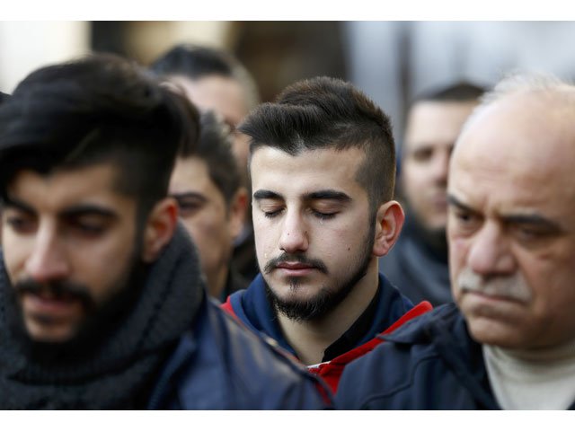 relatives react at the funeral of ayhan arik a victim of an attack by a gunman at reina nightclub in istanbul turkey january 1 2017 photo reuters