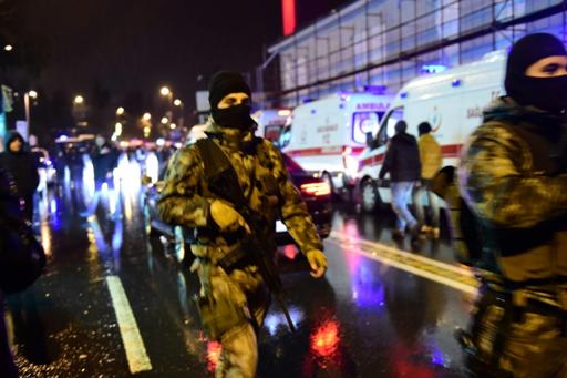 turkish special force police officers and ambulances are seen at the site of an armed attack at the reina nightclub in istanbul on january 1 2017 photo afp