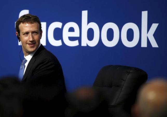 facebook ceo mark zuckerberg is seen on stage during a town hall at facebook 039 s headquarters photo reuters