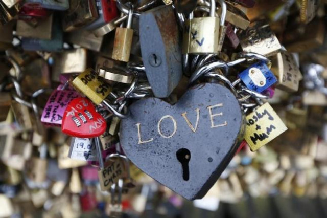 thousands of padlocks clipped by lovers are seen on the fence of the pont des arts over the river seine in paris february 13 2014 on the eve of valentine 039 s day photo reuters thousands of padlocks clipped by lovers are seen on the fence of the pont des arts over the river seine in paris february 13 2014 on the eve of valentine 039 s day photo reuters