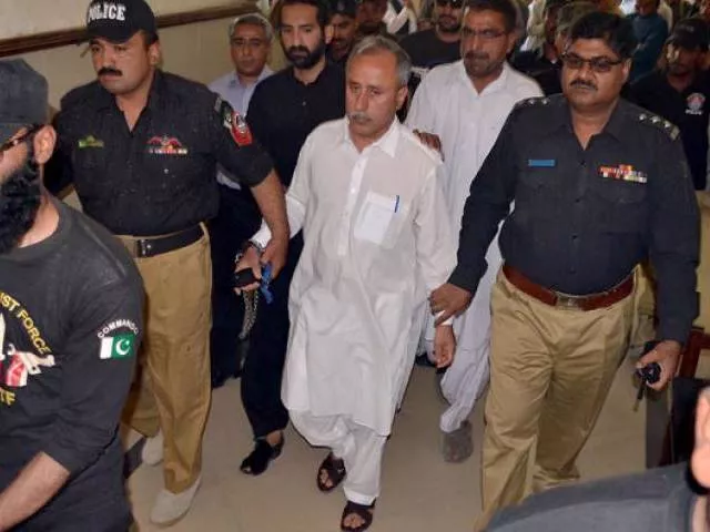 police escort former finance secretary balochistan mushtaq raisani out of an accountability court in quetta on may 7 2016 photo inp police escort former finance secretary balochistan mushtaq raisani out of an accountability court in quetta on may 7 2016 photo inp