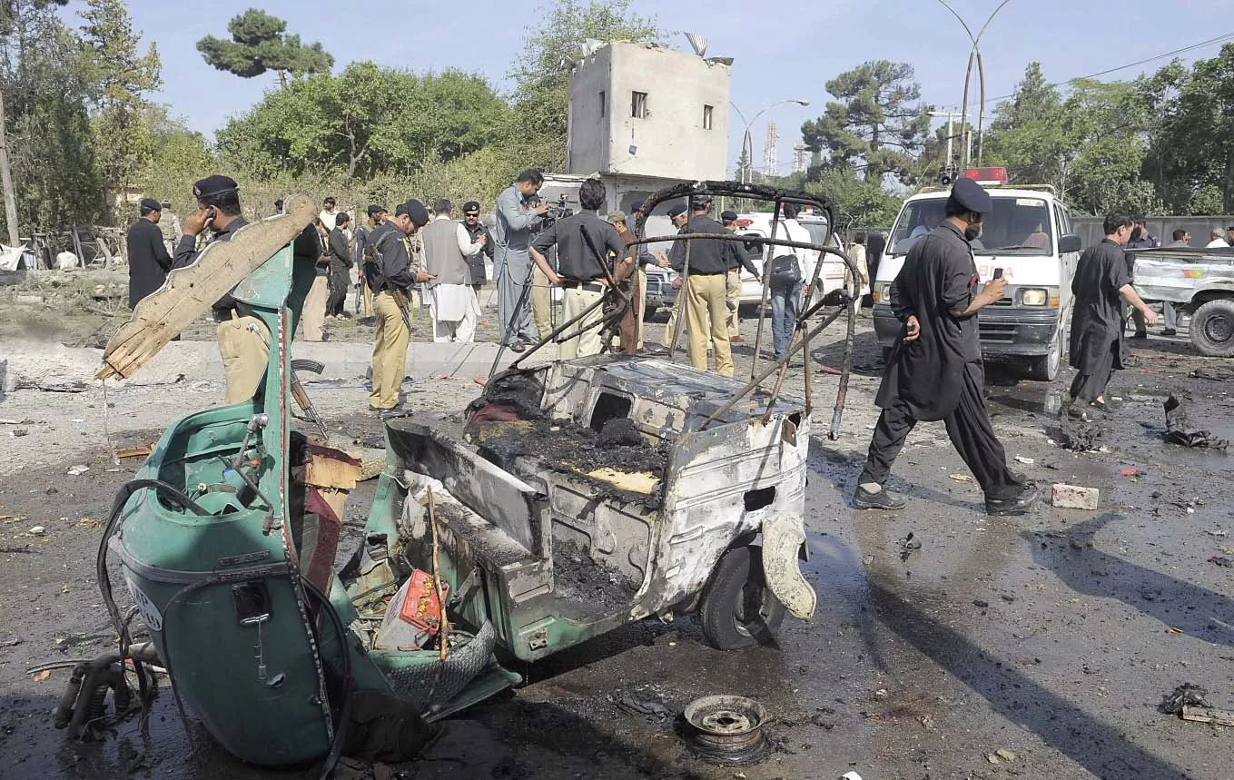 security officials examine the site of the twin suicide bomb attack that wreaked carnage in the capital of the restive province photo file security officials examine the site of the twin suicide bomb attack that wreaked carnage in the capital of the restive province photo file