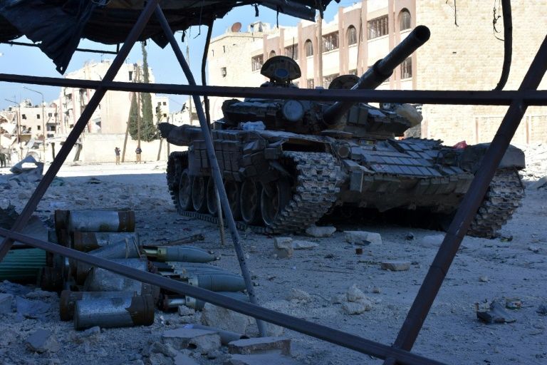 syrian forces advance into the masaken hanano district of eastern aleppo photo afp