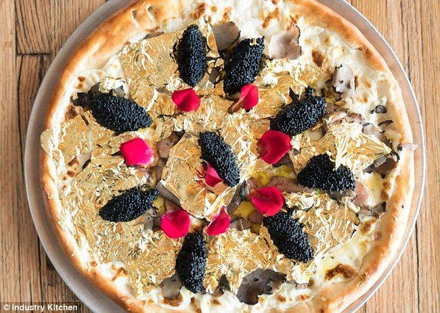 this new york restaurant offers a 2 000 pizza topped with 24 karat gold