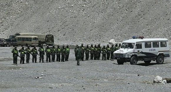 armed chinese border police stand in formation at a camp near the base camp of mount everest also known as qomolangma in the tibet autonomous region april 30 2008 photo reuters