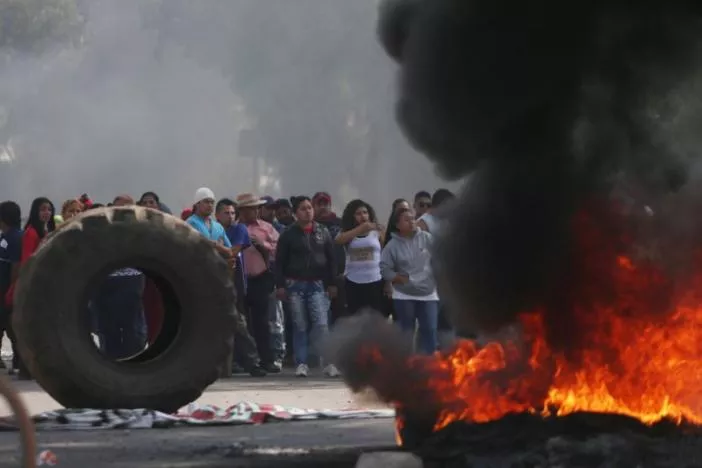 protesters block the entrance to a pemex gas station as they burn tires during a protest against the rising prices of gasoline enforced by the mexican government in san miguel totolcingo mexico january 3 2017 photo reuters protesters block the entrance to a pemex gas station as they burn tires during a protest against the rising prices of gasoline enforced by the mexican government in san miguel totolcingo mexico january 3 2017 photo reuters