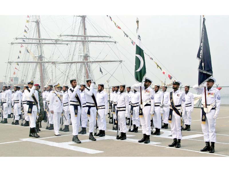 naval chief inspects guard of honour during award ceremony photo app