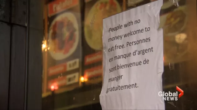 the sign outside march ferdous written in english and french offers free food to those with no money photo global news the sign outside march ferdous written in english and french offers free food to those with no money photo global news