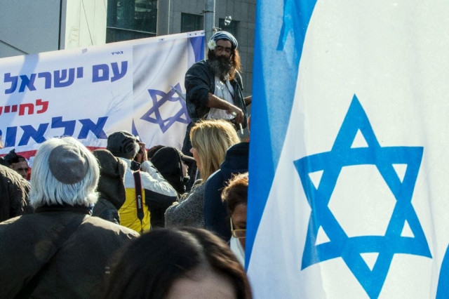 israelis demonstrate outside the defence ministry in tel aviv in support of israeli soldier elor azaria who shot dead a wounded palestinian assailant photo afp israelis demonstrate outside the defence ministry in tel aviv in support of israeli soldier elor azaria who shot dead a wounded palestinian assailant photo afp