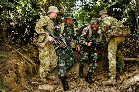 australian army soldiers assist indonesian army personnel during the junior officer combat instructor training course photo reuters