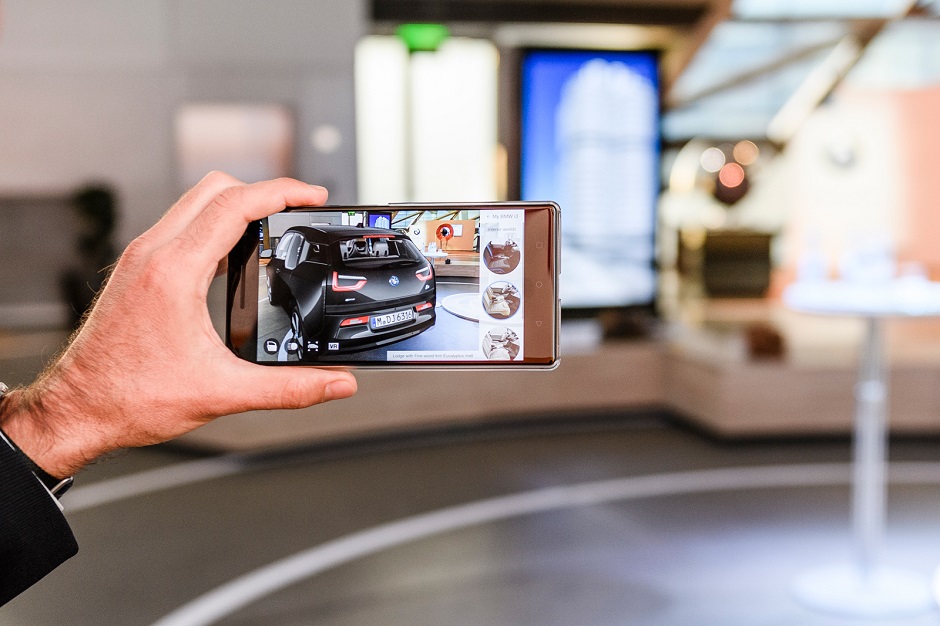 using a smartphone potential buyers can view and interact with a virtual car as if it were standing in front of them photo bmw