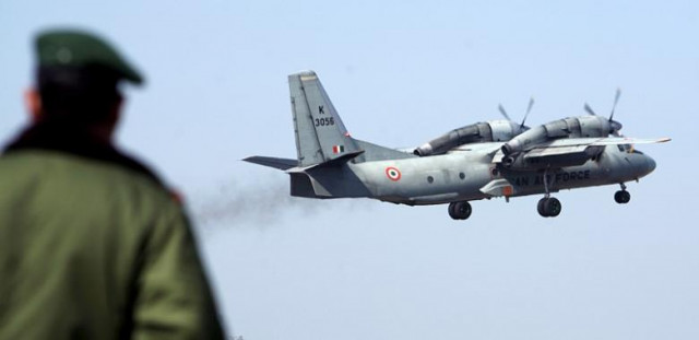 a soldier stands guard as an indian air force an 32 transport aircraft carrying security personnel takes off from the technical airport in jammu february 9 2008 photo reuters a soldier stands guard as an indian air force an 32 transport aircraft carrying security personnel takes off from the technical airport in jammu february 9 2008 photo reuters