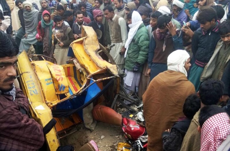 people gather around the damaged rickshaw which was hit by hazara express on january 6 2017 photo online