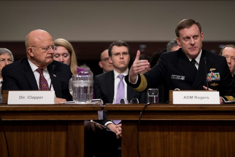 director of national intelligence james clapper l and national security agency director adm michael rogers testify before the senate armed services committee on capitol hill in washington dc on january 5 2017 photo afp