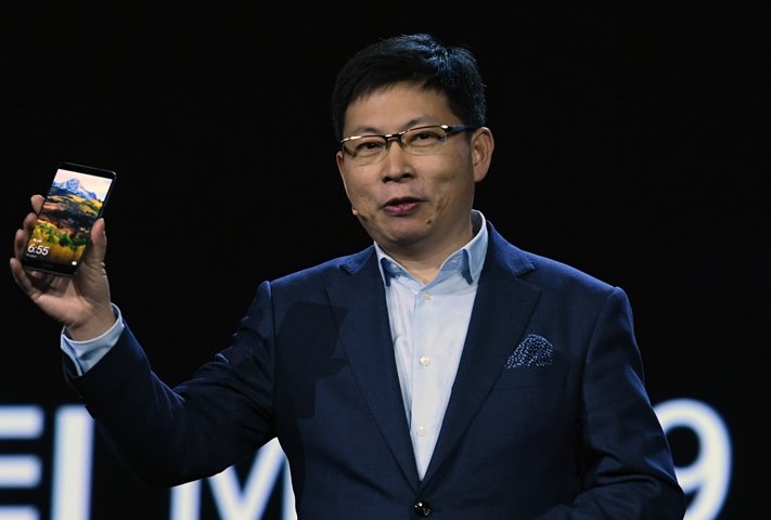 ceo of huawei consumer business group richard yu introduces the huawei mate 9 phone as he delivers a keynote address at ces 2017 at the venetian las vegas on january 5 2017 in las vegas nevada photo afp