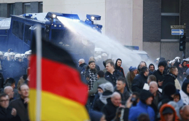 police use a water cannon during a protest march by supporters of anti immigration right wing movement pegida patriotic europeans against the islamisation of the west in cologne germany january 9 2016 photo reuters police use a water cannon during a protest march by supporters of anti immigration right wing movement pegida patriotic europeans against the islamisation of the west in cologne germany january 9 2016 photo reuters
