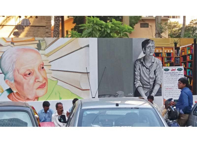 artist restores defaced murals on karachi press club walls