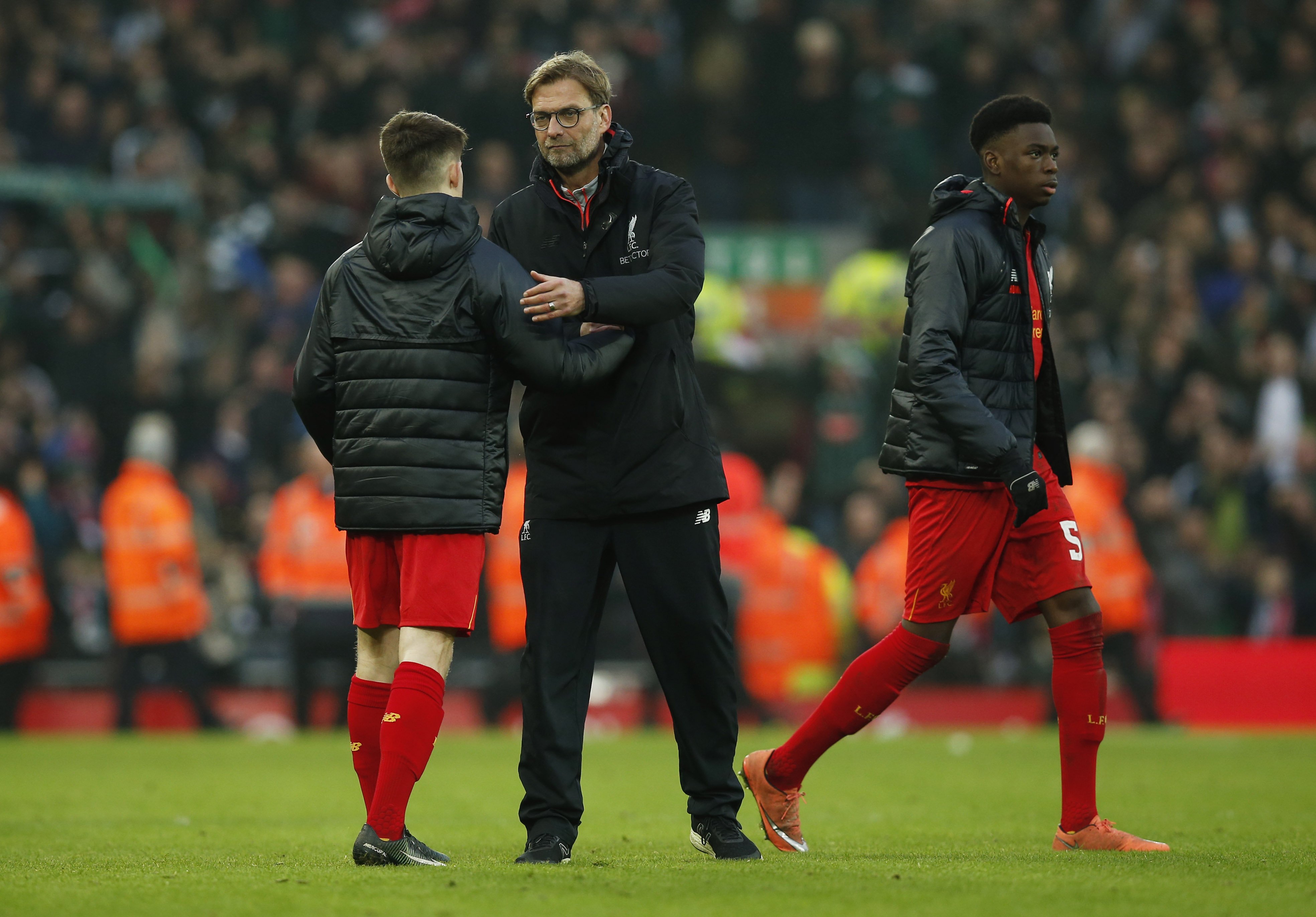 liverpool manager juergen klopp with youngsters after the match against plymouth argyle on january 8 2016 photo reuters