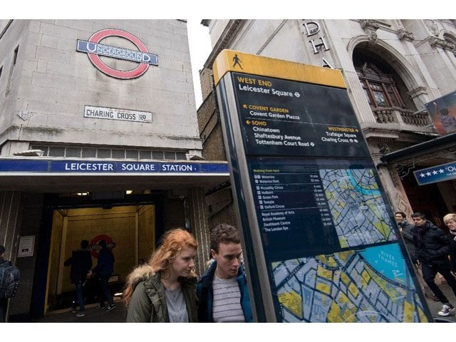 people check an information board outside leicester square underground station in central london on january 8 2017 photo afp people check an information board outside leicester square underground station in central london on january 8 2017 photo afp