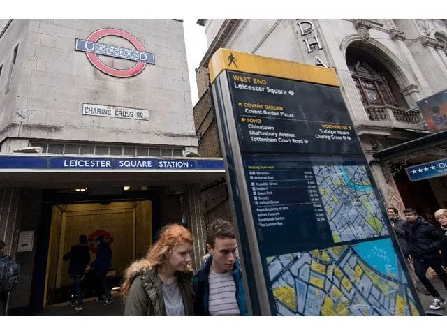 people check an information board outside leicester square underground station in central london on january 8 2017 photo afp people check an information board outside leicester square underground station in central london on january 8 2017 photo afp