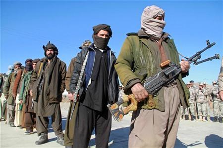 taliban militants hand over their weapons after joining the afghan government 039 s reconciliation and reintegration program in herat january 30 2012 reuters mohammad shoiab