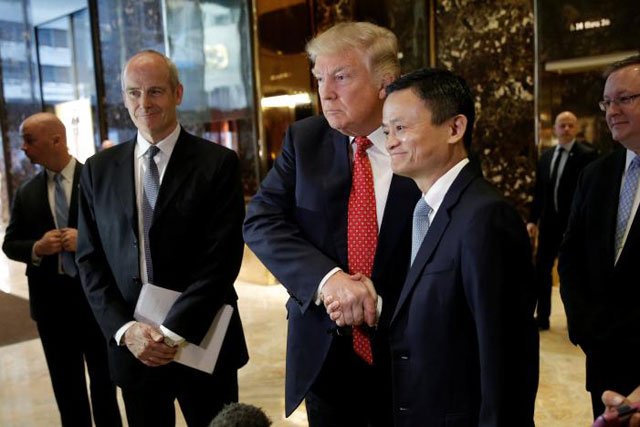 us president elect donald trump shakes hands with alibaba executive chairman jack ma after their meeting at trump tower in new york photo reuters