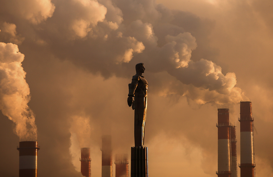 steam rises from chimneys of a heating power plant near a monument of soviet cosmonaut yuri gagarin the first man in space with the air temperature at about minus 17 degrees celsius 1 4 degrees fahrenheit during sunset in moscow russia photo reuters