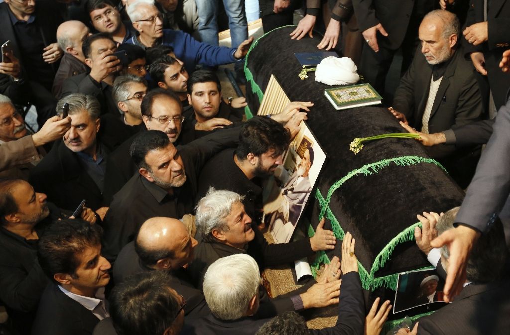 mourners gather around the coffin of former iranian president akbar hashemi rafsanjani during a ceremony at the jamaran mosque in tehran on january 9 2017 photo afp