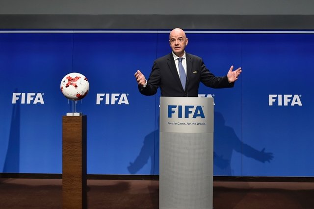 international federation of association football fifa president gianni infantino gestures while speaking during a press briefing closing a meeting of the fifa executive council on january 10 2017 at fifa headquarters in zurich photo afp